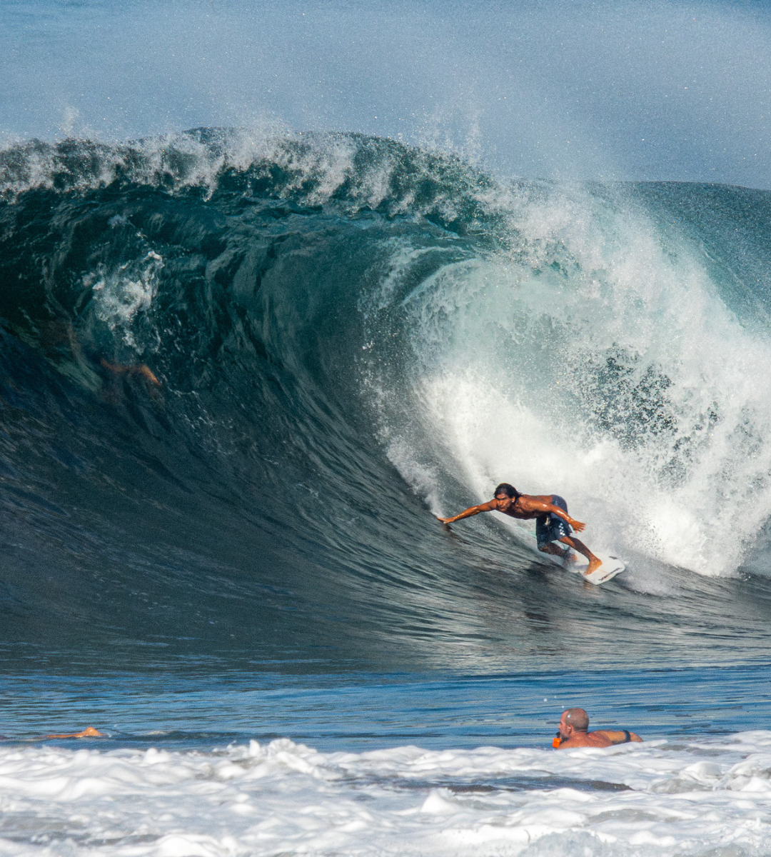 Jair Perez surfing at Playa Hermosa photographed by Frency Sanchez